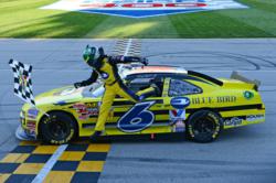 Ricky Stenhouse Jr. wins the Dollar General 300 in the No. 6 Blue Bird and ROUSH CleanTech sponsored car